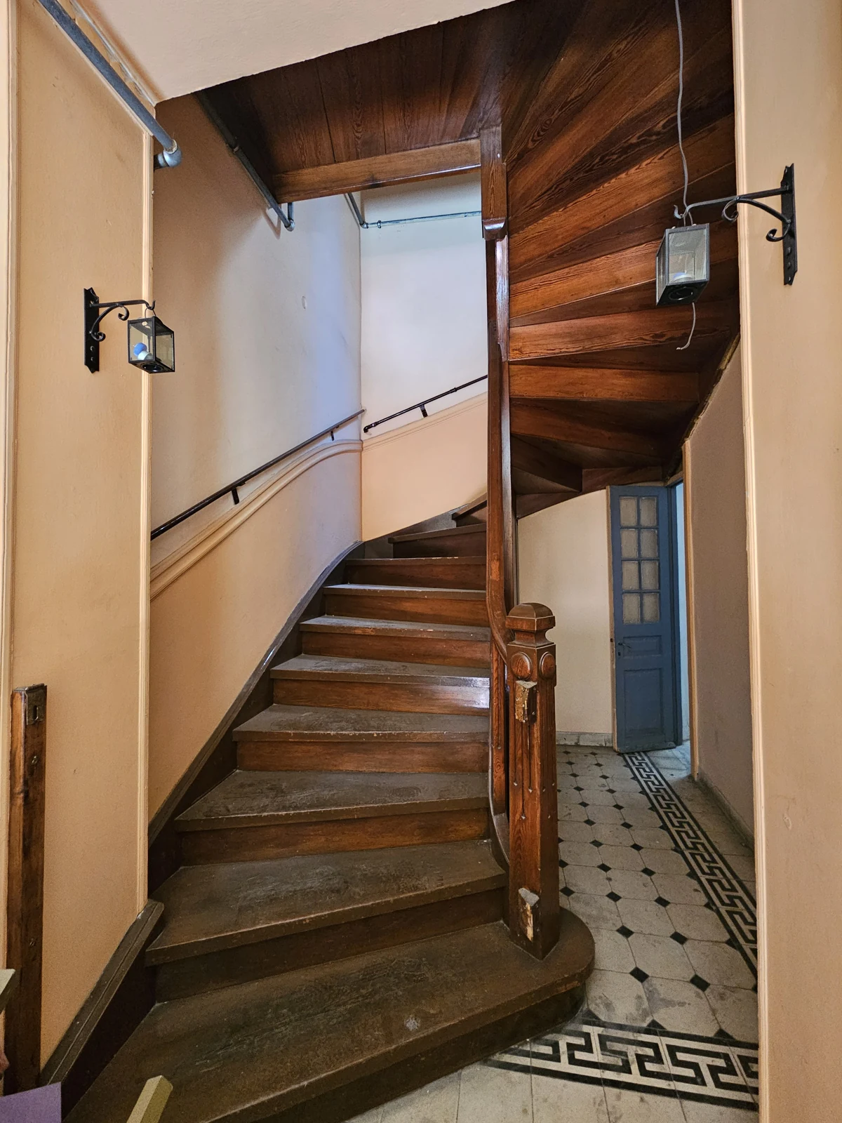 First floor, current condition — shared timber staircase