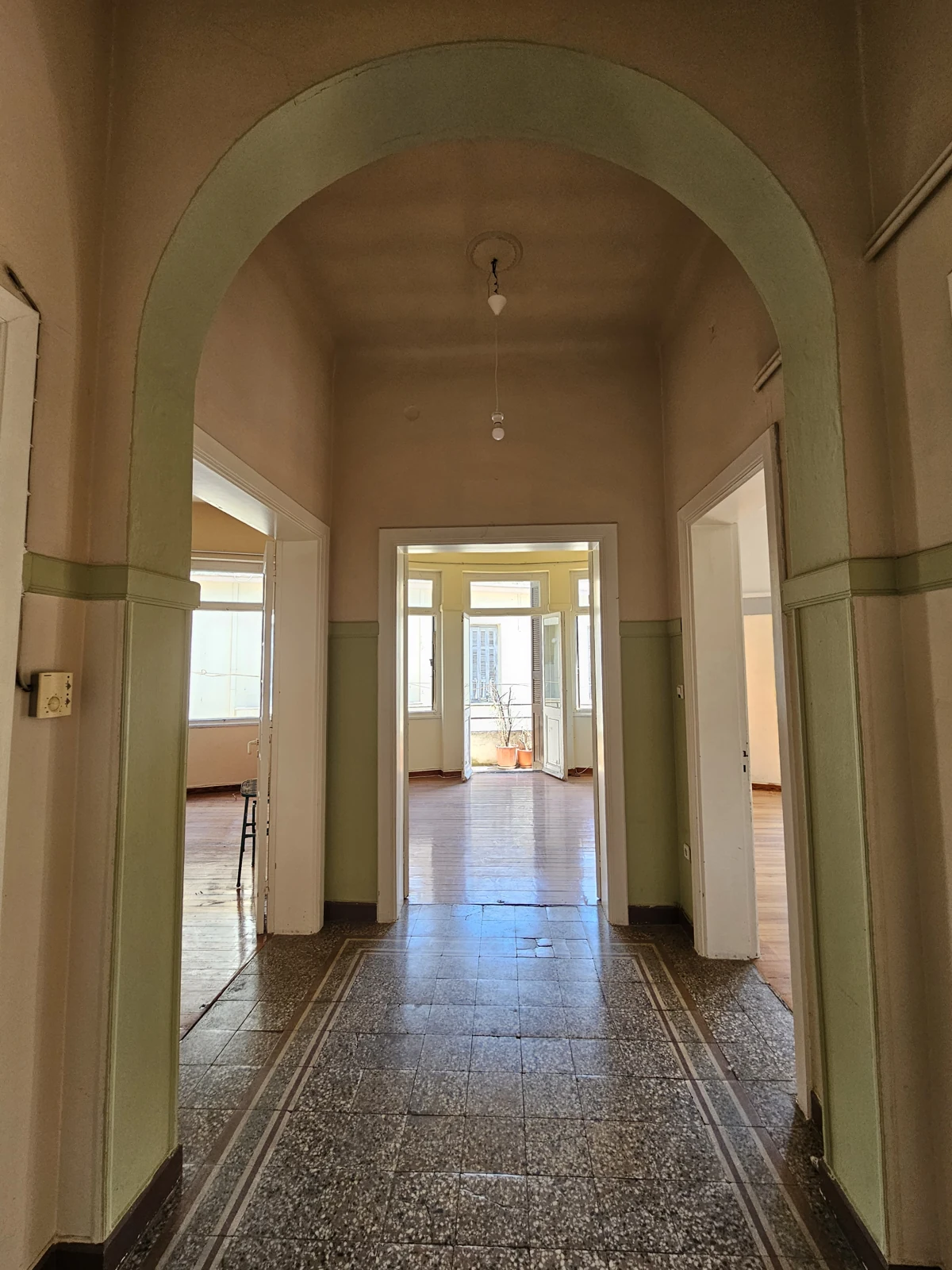 Second floor, current condition — arched circulation hall